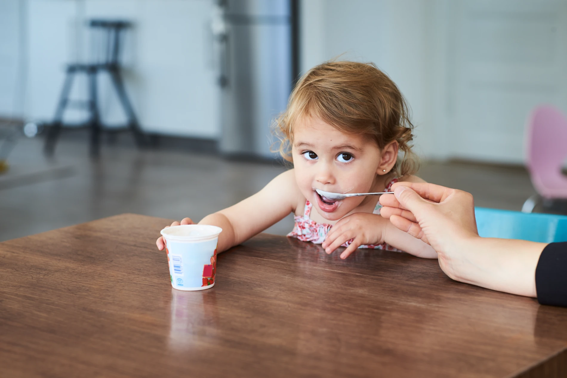 Girl eating yogurt