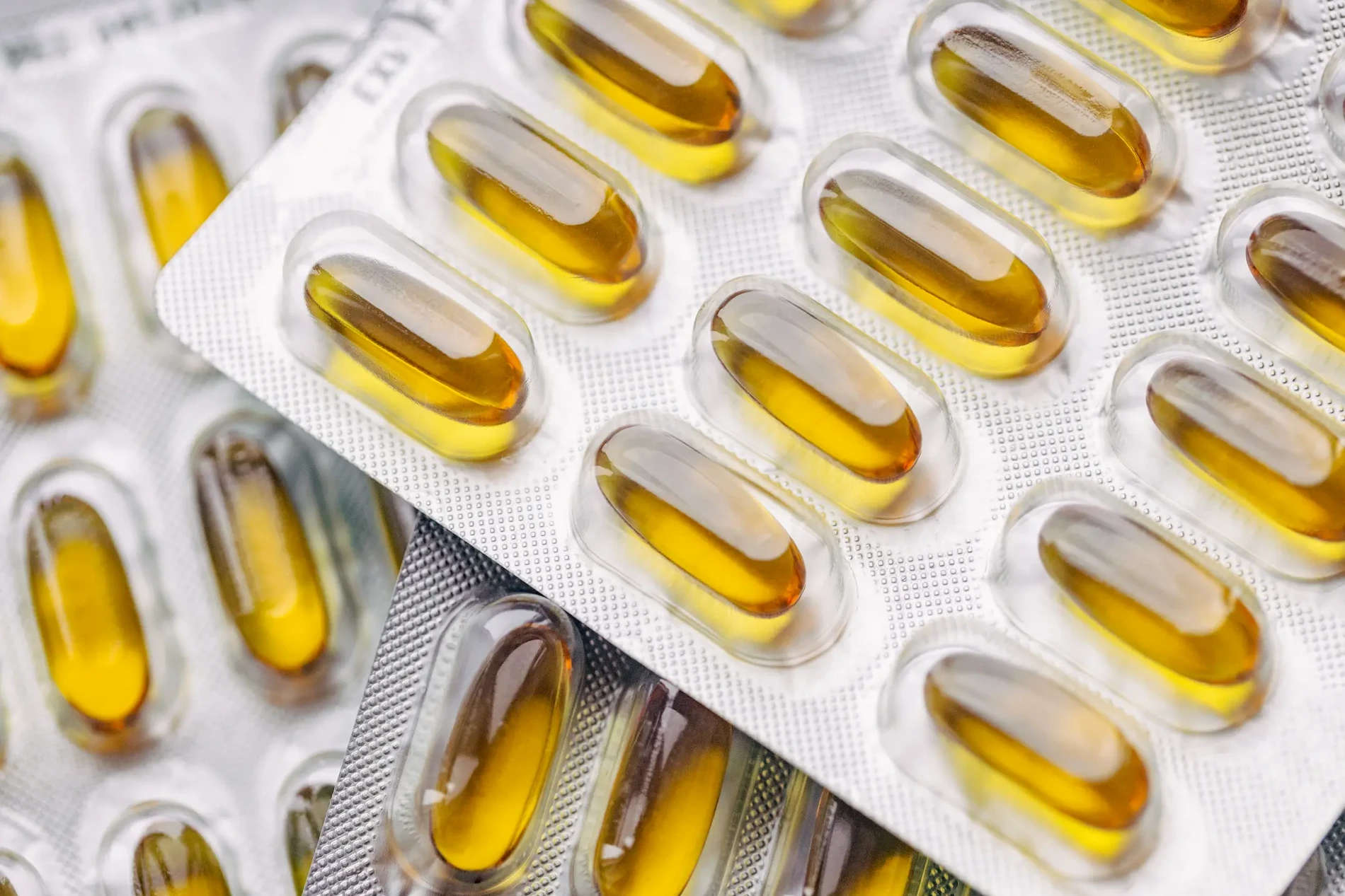 A closeup of fish oil pill